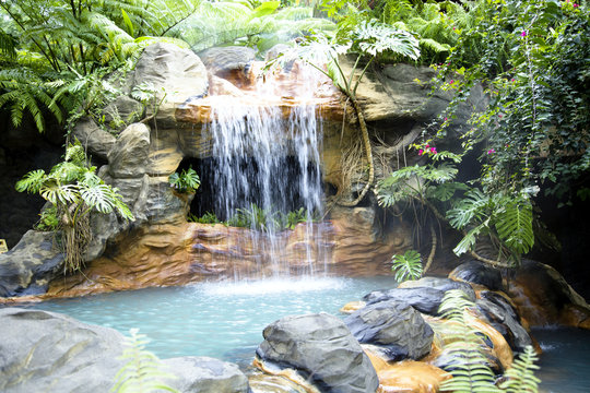 Little pool with a waterfall and hot thermal water, Costa Rica