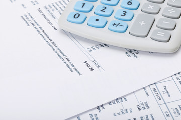 Receipt next to calculator - studio shot