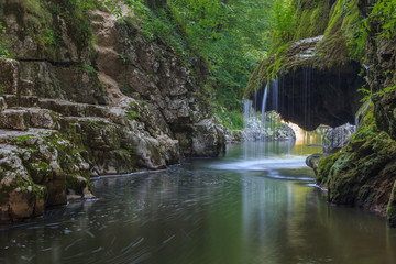 Bigar Cascade Falls in Beusnita Gorges National Park, Romania