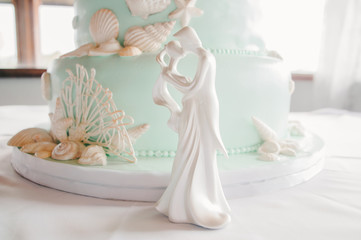 Fototapeta na wymiar White Porcelain Couple Figurine
