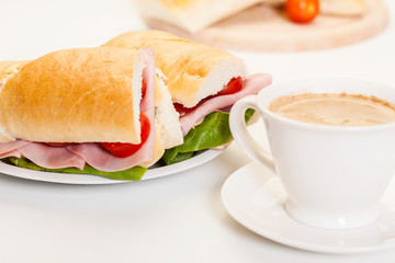 Panini sandwich with ham, cheese and tomato