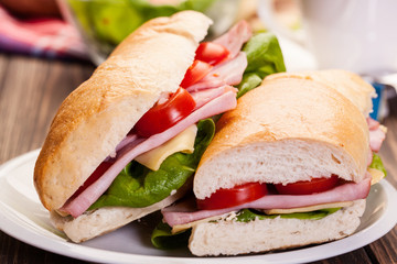 Panini sandwich with ham, cheese and tomato