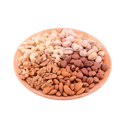 Set of nuts on bowl isolated on white background