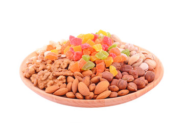 Set of nuts on bowl isolated on white background