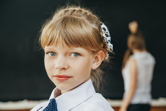 young girl in classroom. School. fashion