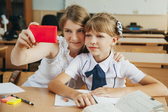 Two girl. Selfie. School