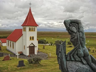 Fototapeten Sommer Red Roof church in Iceland  © Andrea Izzotti