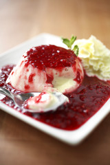 close up strawberry pudding cake and sweet sauce