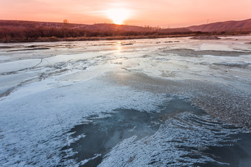 lake at sunset in winter