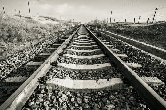 Fototapeta Disappeared in the horizon line tracks.
