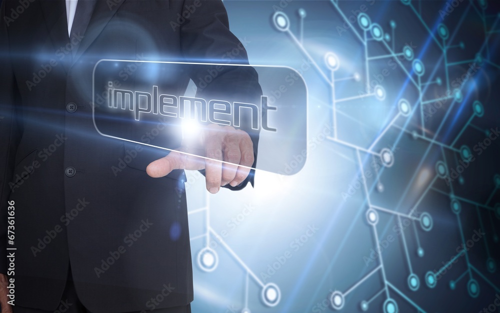 Poster Businessman pointing to word implement