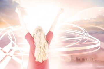 Composite image of cheering football fan in red