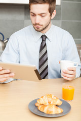 Doing breakfast and drinking coffee