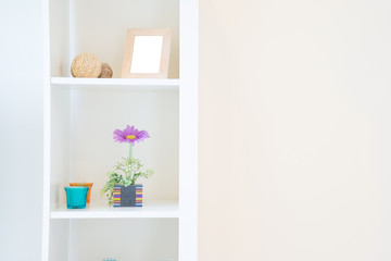 shelves on the white wall