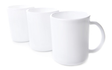 Set of white cups isolated on white