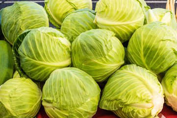 Green cabbages on display at the market