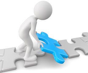 Männchen setzt Puzzle zusammen