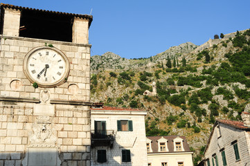 Fototapeta na wymiar Clock tower an fortless at Kotor