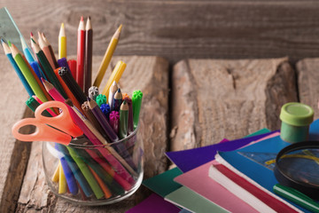 Back to school concept on wooden background