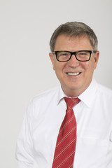 Portrait of young happy smiling business man, isolated over whit