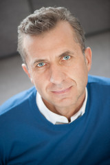 Portrait of handsome mature man - vertical