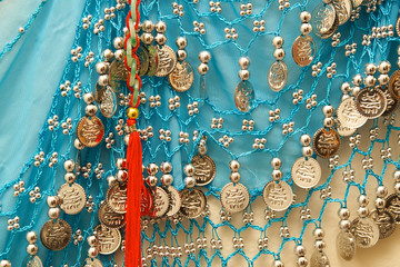 blue vintage belly dancer skirt with red tassel