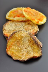 Melanzane e cipolle gratinate