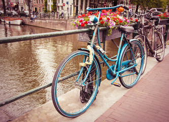Fototapeta na wymiar Retro and vintage style bicycle in Amsterdam, Netherlands
