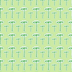 Seamless pattern with silhouettes of leaves on stems