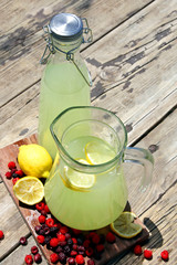 Fresh Squeezed Lemonade in Pitchers with Raspberry Fruit