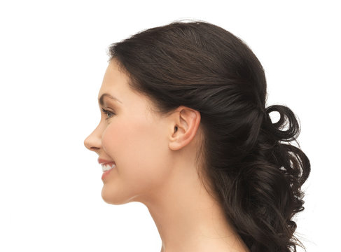 profile portrait of smiling young woman