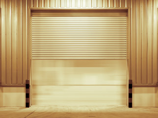 Roller door or roller shutter. Also called security door or security shutter with automatic system. For protection residential and commercial building i.e. house, warehouse, factory, shop and store.