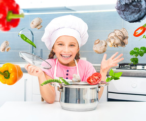 little girl preparing vegetarian soup