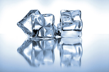 Ice cubes on blue background
