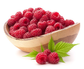 raspberries in wooden bowl