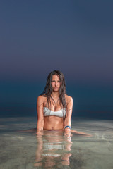 Beautiful woman on the beach.