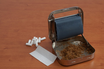 Cigarette rolling machine