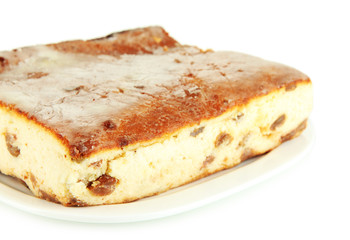 Cheese casserole with raisins on plate isolated on white