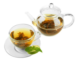 Cup and teapot of green tea isolated on white