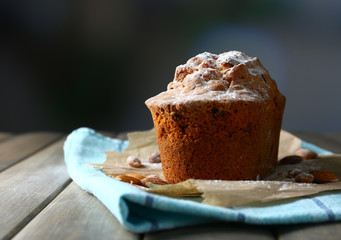 Tasty cake on table on dark background