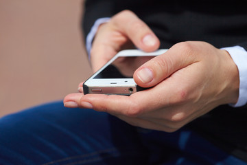 woman's hands with mobile phone