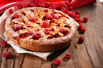 Tasty cake with berries on table close-up