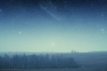 field at night. Elements of this image furnished by NASA