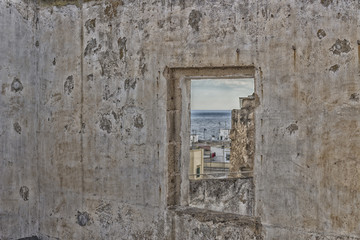 Square window on Doxi Stracca Fontana Palace in Gallipoli (Le)