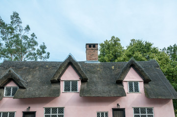 Terracotta thatched roof of a cottage in rural England, UK