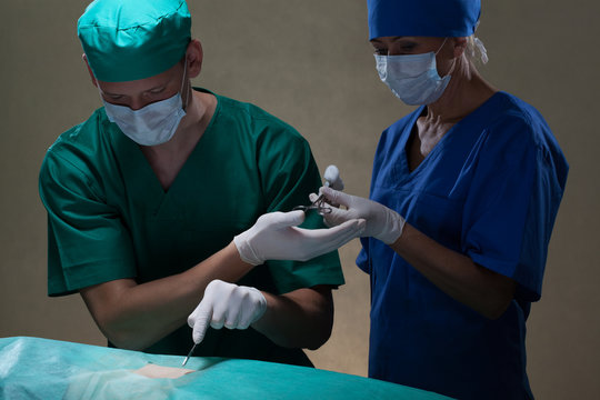Doctor and assistant during surgery