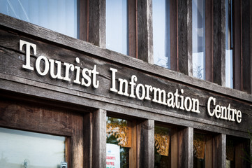 Fototapeta na wymiar Toursit information centre sign on timber frame