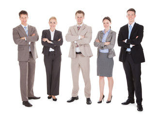 Obraz premium Confident Business Team Standing Arms Crossed