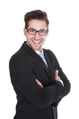 Businessman Standing Arms Crossed Over White Background