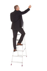 Businessman Climbing Ladder